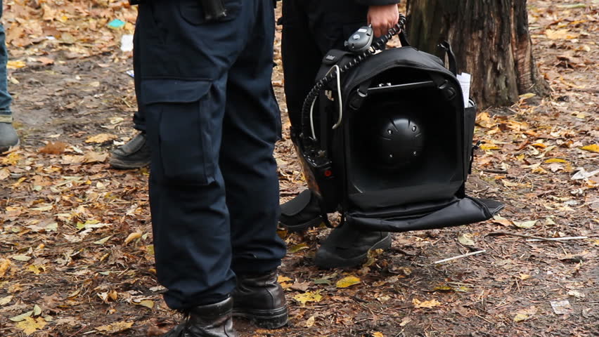 Sound cannon. Toronto police with LRAD (long range acoustic device), or "acoustic weapon". 