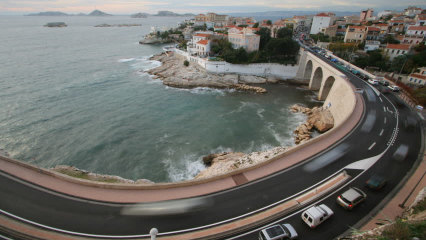 long exposure time-lapse shot of traffic on the bend in the corniche road, marseilles