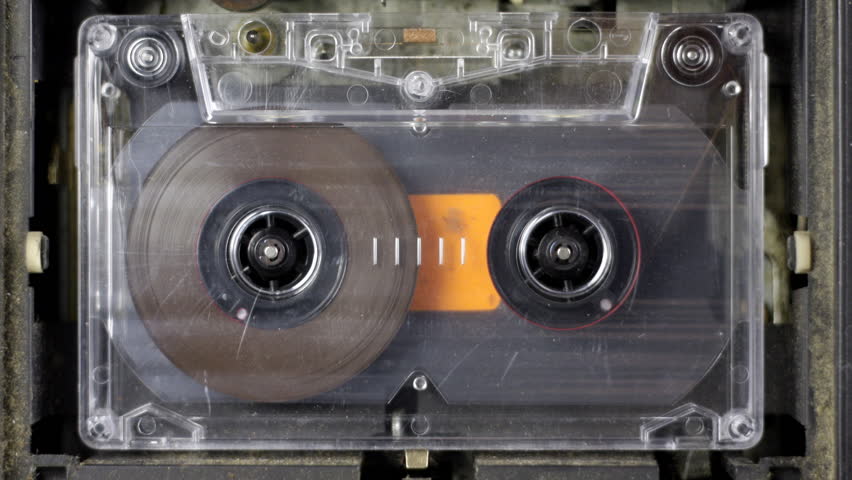 old music cassettes rewinding/fastforwarding
