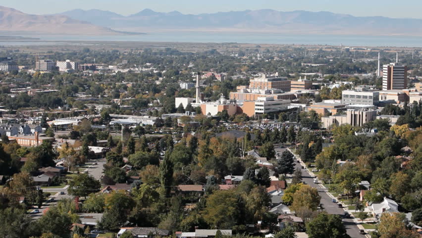 Brigham Young University in Provo, Utah. Campus buildings and roads with traffic. Tree lined streets. Education center central Utah. Owned by Church of Jesus Christ of Latter-Day Saints, LDS Mormon.