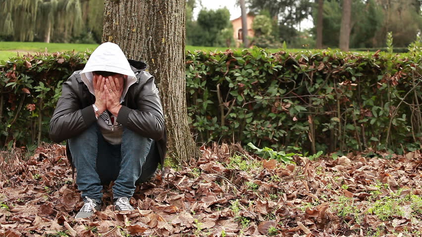 Sad boy at park