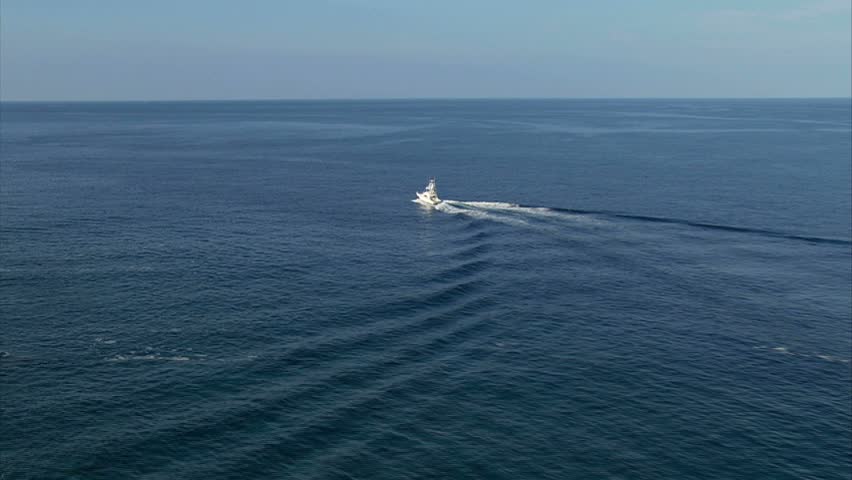 Fishing, Low Fly-by of fishing charter boat off the Kona Coast