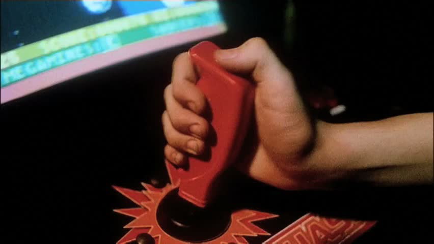 Close-up hand on joystick