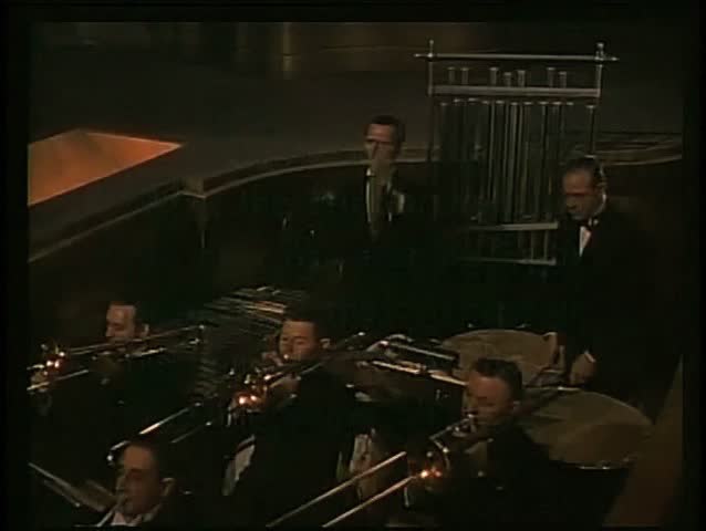 Orchestra playing in theater