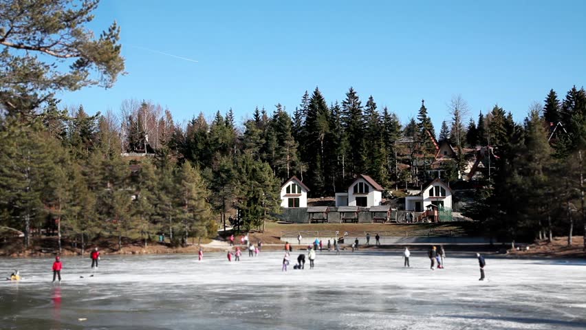 Ice Skating on a Frozen Lake 