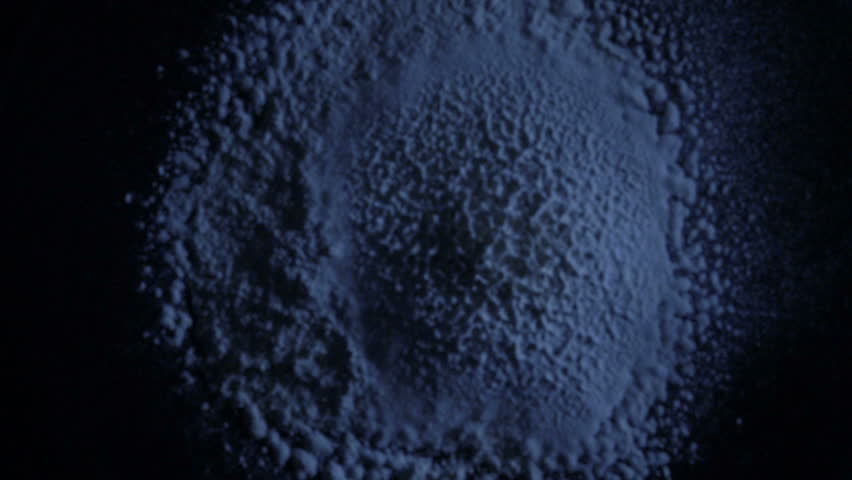 Blue particles fly after being exploded