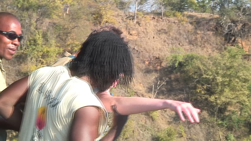 LIVINGSTONE, ZAMBIA - MAY 23, 2006: Tandem bungee jumping at Victoria Falls