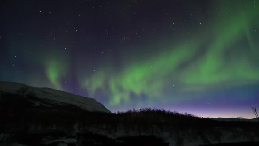Aurora borealis over a canyon in Scandinavia