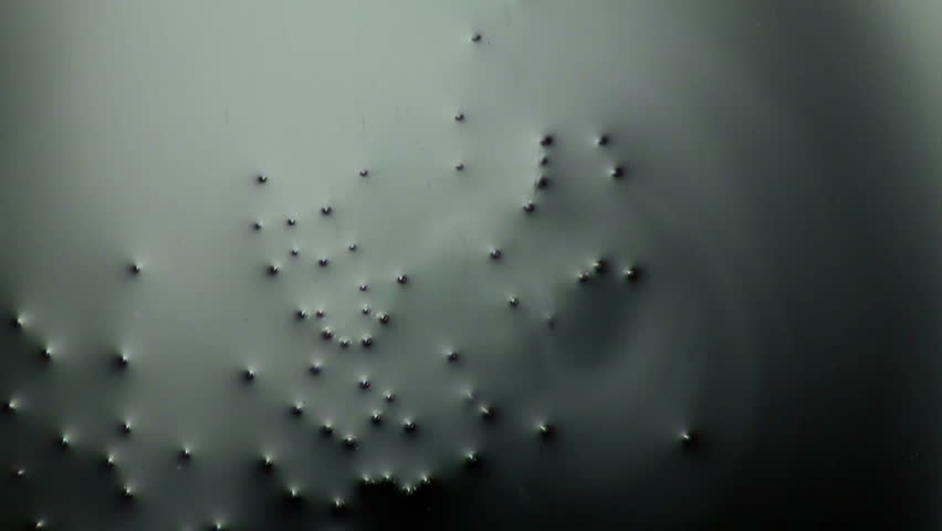Plastic metallic bubbles moving and popping. video background.