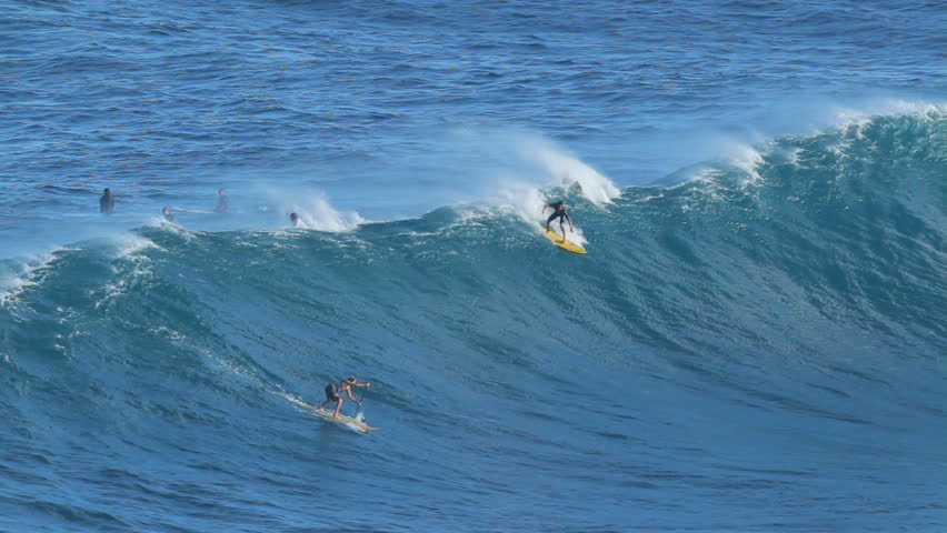 MAUI, HI - January 31: Professional surfer Kai Lenny rides a giant wave at the legendary big wave surf break known as "Jaws" during one the largest swells of the winter January 31, 2012 in Maui, HI.