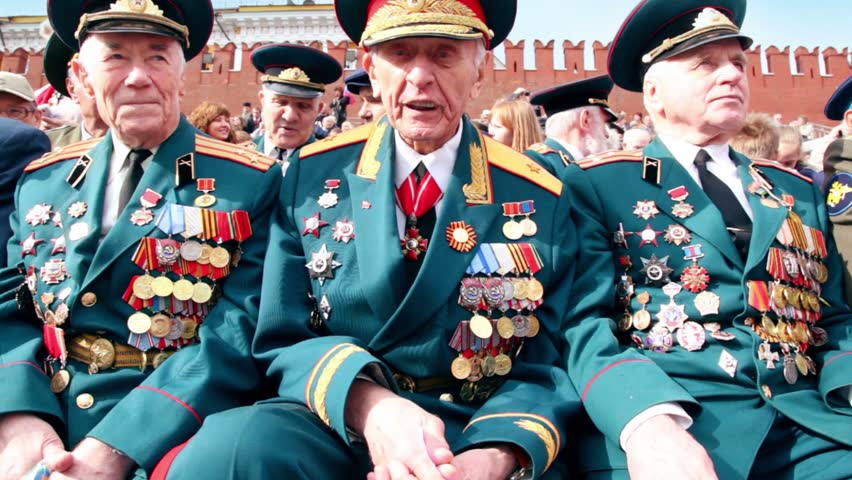 MOSCOW - MAY 9: Veteran general Linik V.G. speak about war at background of Kremlin wall on May 9, 2011 in Moscow, Russia