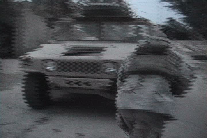 BAGHDAD, IRAQ - CIRCA 11/25/03: U.S. Soldiers practice reacting to an ambush in soft skin humvees.
