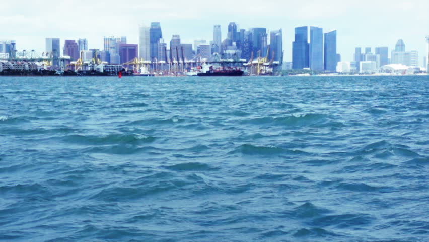 A long shot of a cityscape with harbor