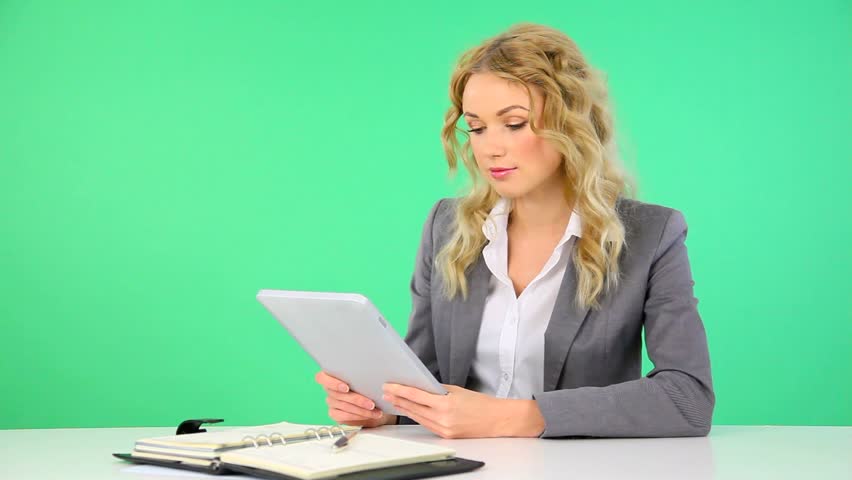 Businesswoman working on electronic tablet