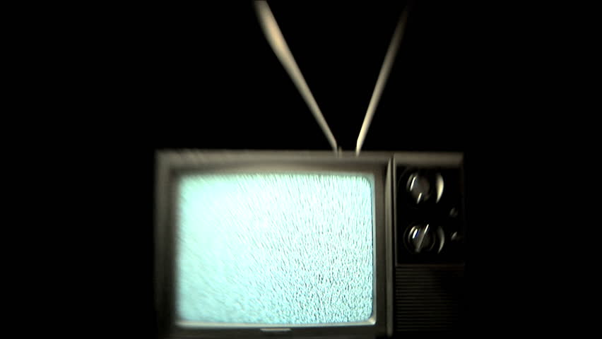 Static TV, Older television playing static, zoom in