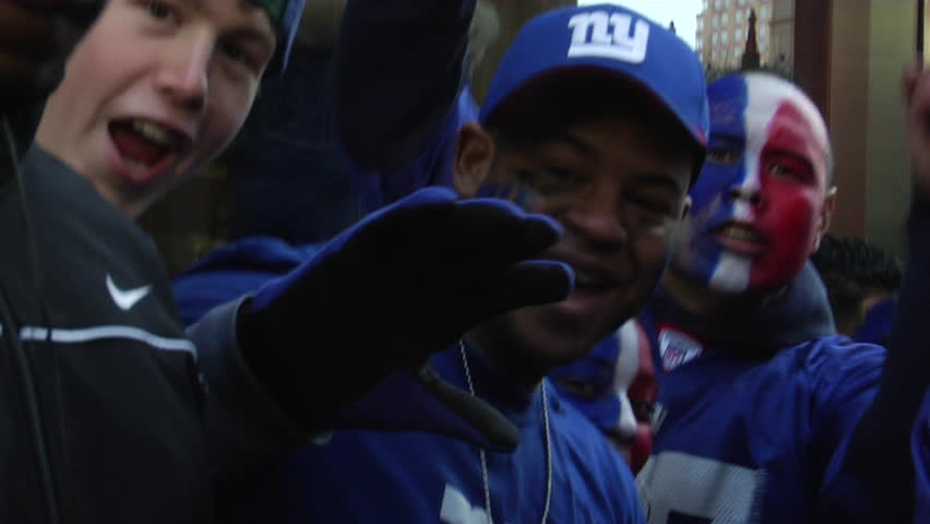 NEW YORK - FEBRUARY 7: Fans wait in anticipation of the ticker-tape parade in honor of the Super Bowl Champions New York Giants on February 7, 2011 in New York. 
