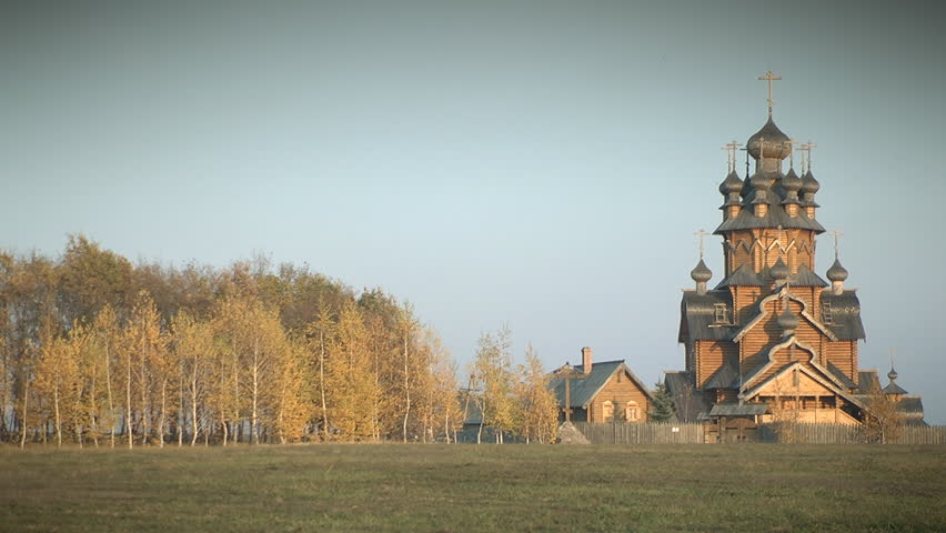 Wooden monastery in autumn forest. Svyatogorsk, Ukraine