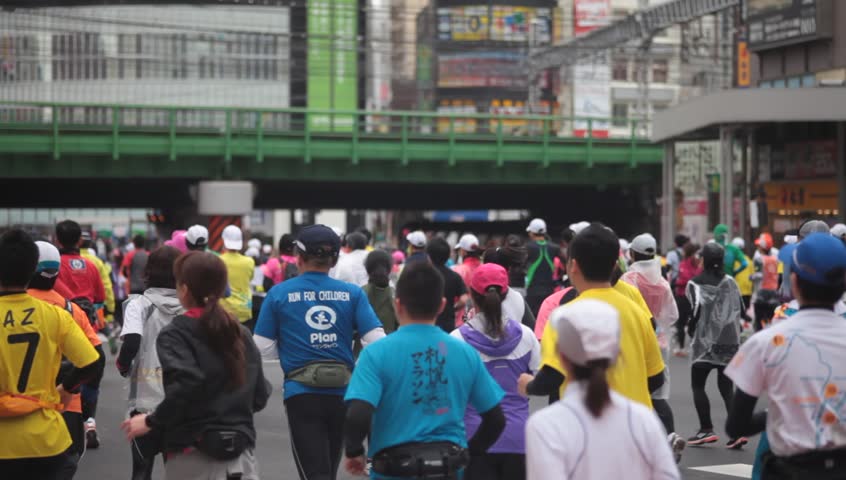 TOKYO - FEBRUARY 26: Unidentified athletes in the Tokyo Marathon on February 26, 2012 in Tokyo, Japan. With more than 36,000 participants the annual marathon is the country's biggest event.