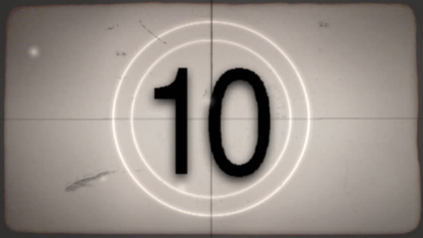 2 versions of an old-fashioned film countdown leader (color and desaturated sepia) with crackling audio.