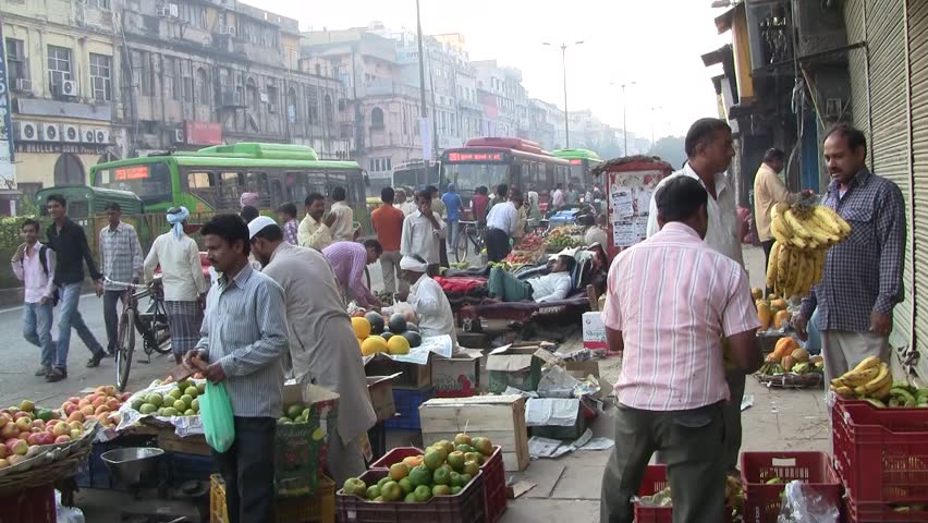 DELHI - NOV 13: Vegetable street vendors with their mobile stands on November 13, 2011 in Delhi, India. India ranks second worldwide in farm output. Agriculture employs 52.1% of the total workforce.