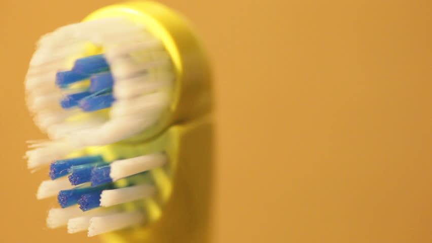 Electric toothbrush spinning
