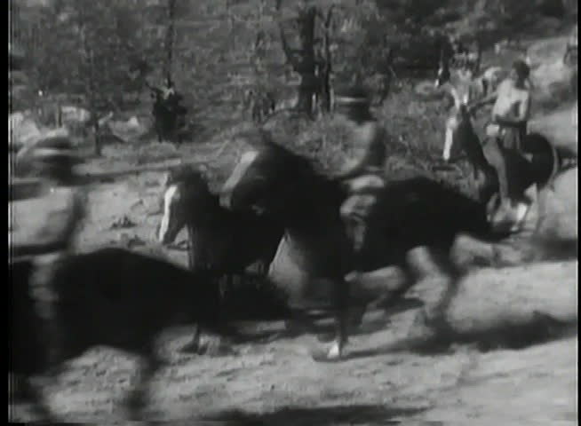 Man dragged under covered wagon while being chased by Apaches