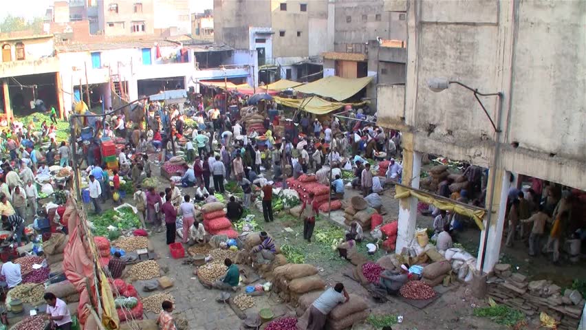 Crowded market with vendors selling vegetables on a local market on November 13, 2011 in Delhi, India. 