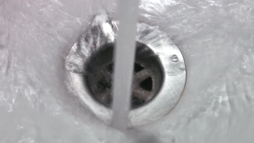 Streaming water in sink.