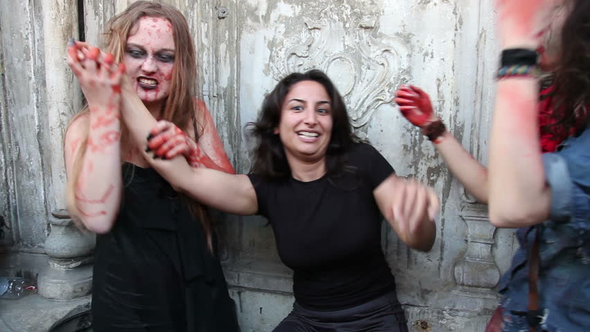 ISTANBUL - APRIL 8: Girls having fun at zombie walk on April 8, 2012 in Istanbul.This was the second annual zombie walk event held in Istanbul. 