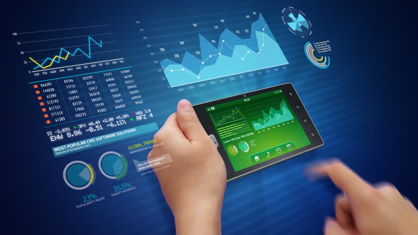 Hands holding and using business application on a tablet computer