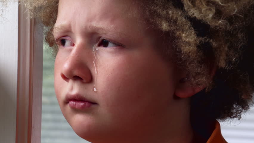 Young boy crying. 