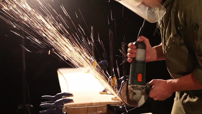 Workman in joinery workshop.