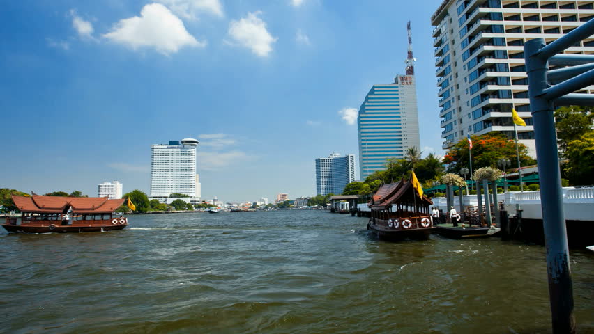 BANGKOK - APRIL 8, 2012: Motion Timelapse - View from Taxi Boat on Chao Phraya river in Bangkok, Thailand