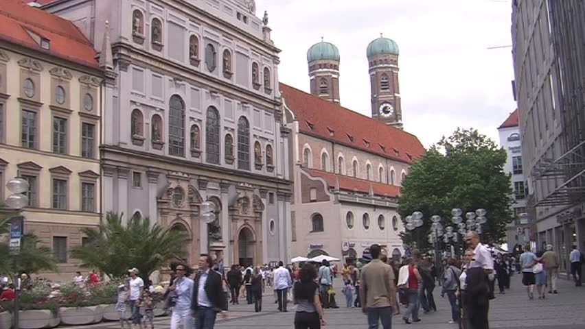 Munich pedestrian street with the emblematic towers of the Frauenkirche (church or our lady) in the bgr. - SD 16:9, Panasonic NV-GS500