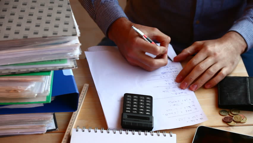 Angry man wrong calculations and ripping the paper