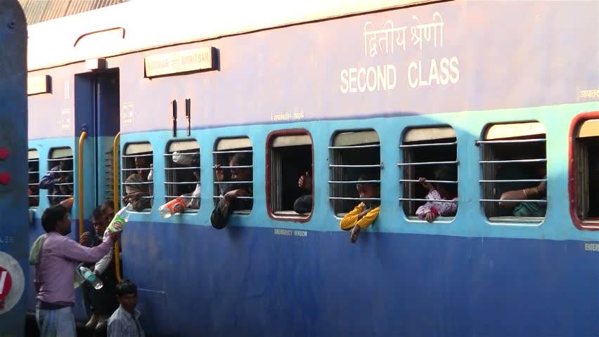 DELHI - NOV 13: People waiting on the train in the Delhi Junction Railway Station on November 13, 2011 in Delhi, India. Delhi Junction is the oldest railway station of Delhi city.
