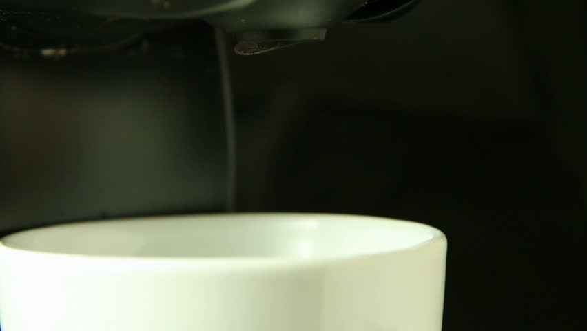 expresso coffee machine serving coffee