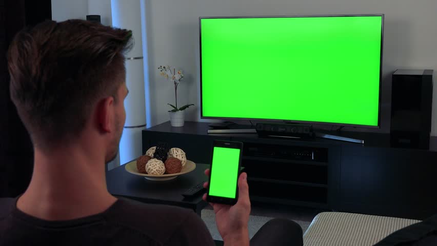 Man Watches Tv(television) - Green Screen - Discontented Man Shakes His 