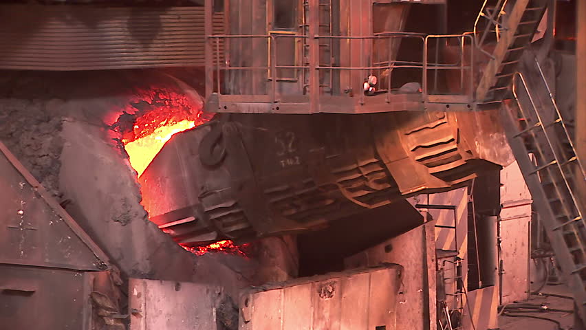 Iron and Steel Works. Converter plant. Loading scrap metal into a melting furnace.