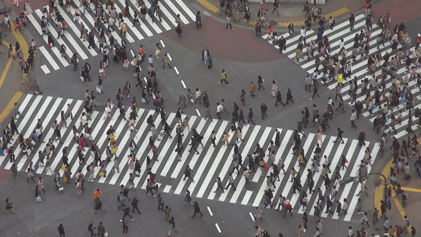 People waiting to cross Shibuya pedestrian street, Tokyo, Japan
