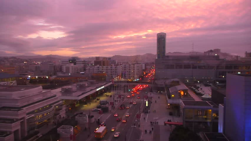 SAN FRANCISCO - CIRCA OCTOBER 2010: Rush hour traffic with people activity downtown around convention in downtown San Francisco, California at sunset, time lapse.