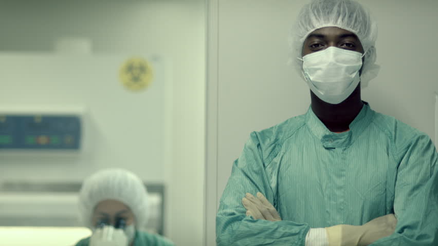 People portrait of man and woman, lab staff at work in pharmaceutical laboratory and medical industry