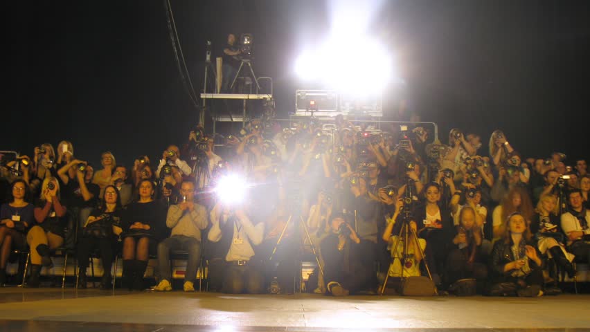 MOSCOW - APR 8: (Timelapse View) Many photographers photograph fashion show on VOLVO - Week of fashion in Moscow in Gostini dvor, on April 8, 2012 in Moscow, Russia