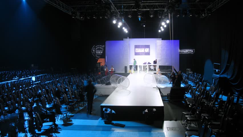MOSCOW - APR 8: (Timelapse View) Workers dismantle scenery on podium after mannequin parade on VOLVO - Week of fashion in Moscow in Gostini dvor, on April 8, 2012 in Moscow, Russia