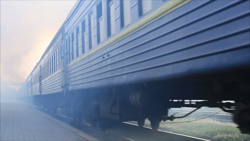 Train departs from the station and smokes heavily 1