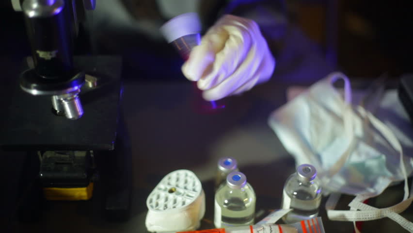 Scientist looking at a blood test