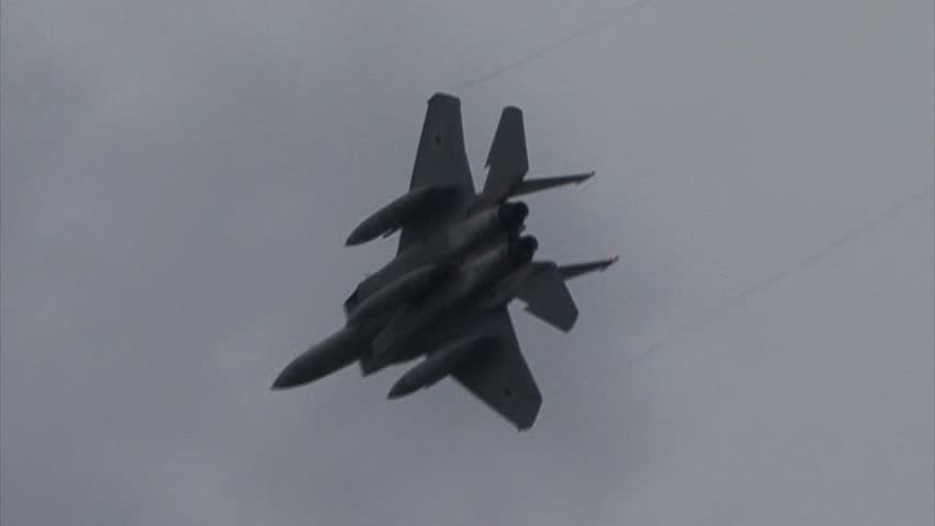 SHIZUOKA, JAPAN - MAY 20:  F-15J Eagle pass and turn as part of the Japan Air Self Defense Force base on May 20, 2012 in Shizuoka, Japan.