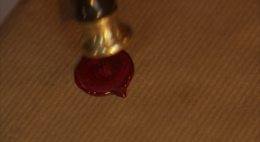 Sealing a Christmas present with sealing wax