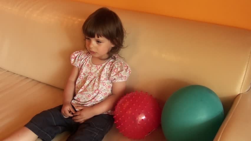two-year old girl with an interest in watching a movie