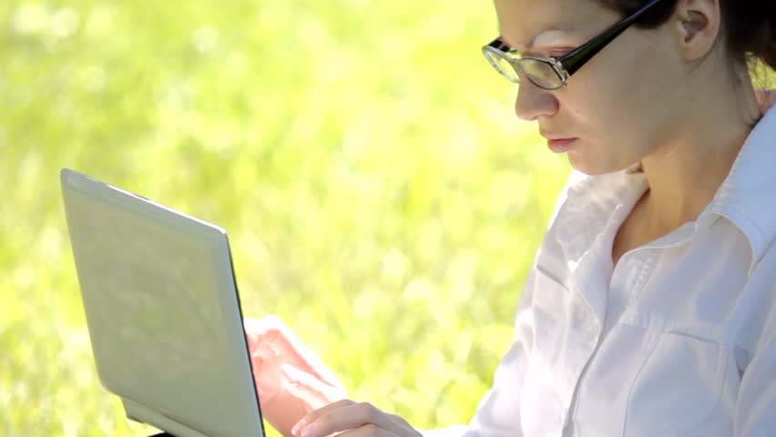 young pretty girl working on laptop